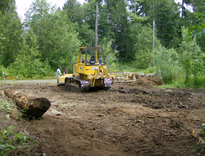 the land partly leveled and cleared