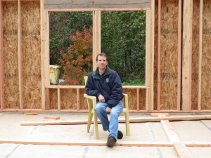 Tom in front of his windows.  One of the best views in the house, he will see the lovely ornamental maple, the lilacs, the peach and the flowers in the entry garden.  I think he'll like it a lot.