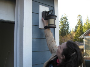 Seeing how the exterior fixture will look on the garage (just one on the garage since it's a single-car unit...)