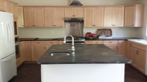 Not well seen in these pictures is how the white fridge, white island, white dishwasher and old white sink brighten up the space.