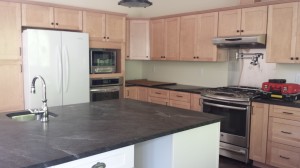 from this angle the stainless appliances make sense -- all the baking/cooking materials are stainless!