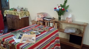 The bookshelf was built by my father, the hutch top was damaged but the lower half is fine on the left and will soon be filled with serving dishes.