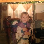 Grant and his Snowman toy, off on an adventure in the back yard.