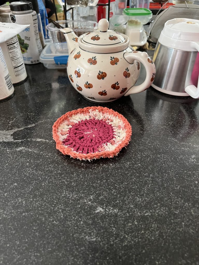 The pink trivet made with simple double-crochet pattern using Sugar and Spice 